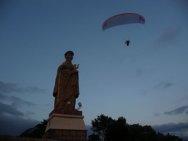 03 Mar 2009<br>Carraguatatuba. Flight above the Sao Antonio, patron saint of married. The 15m high statue is a real game for paragliders on the run. <br> Carraguatatuba, Rio de Janeiro, Brazil