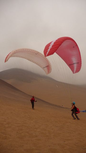 18 Jul 2009<br>Nadège and I swell our sails in a beautiful set. My dream to share my dreams come true. <br> Iquique, Chile
