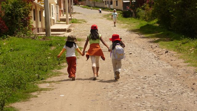 Young children home from school. Ibarra, Ecuador