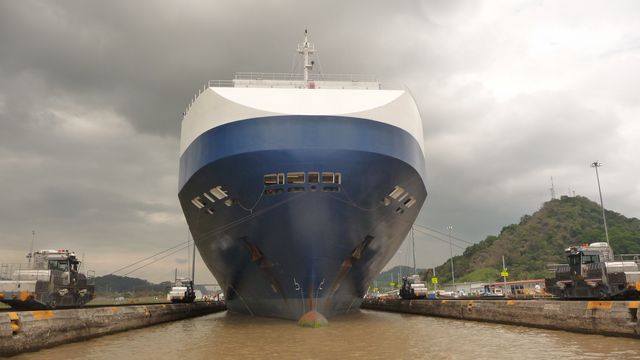 08 Mar 2010<br>Disproportionate size of the ship from the channel. Here the standard &quot;Panamax&quot; cargo makes sense. Some 20 cm just separate the hull from the banks of the lock. Gatun Lock, Panama Canal, Panama